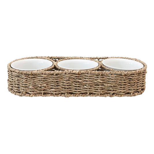 Woven basket with ceramic bowls